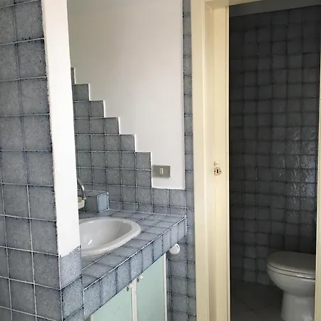 Lägenhetshotell Baia Dei Delfini 3*